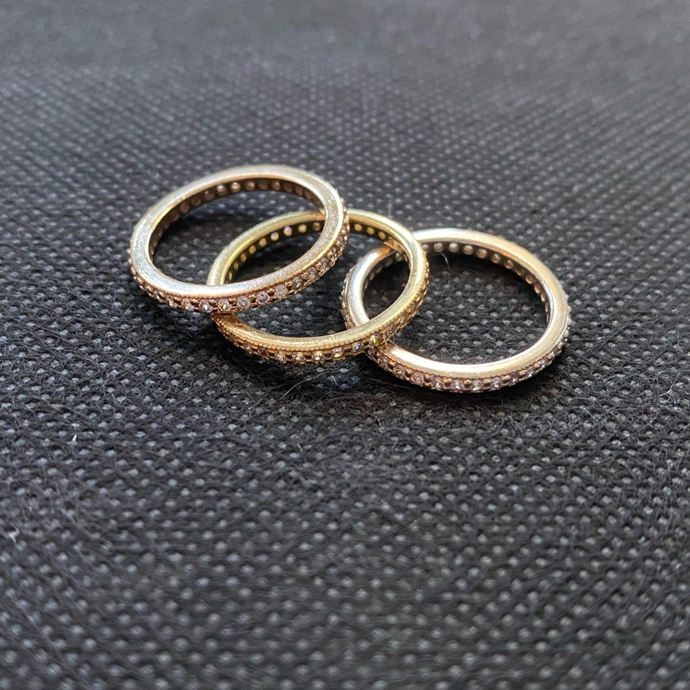 3 Stella & Dot eternity rings and 3 silver rings